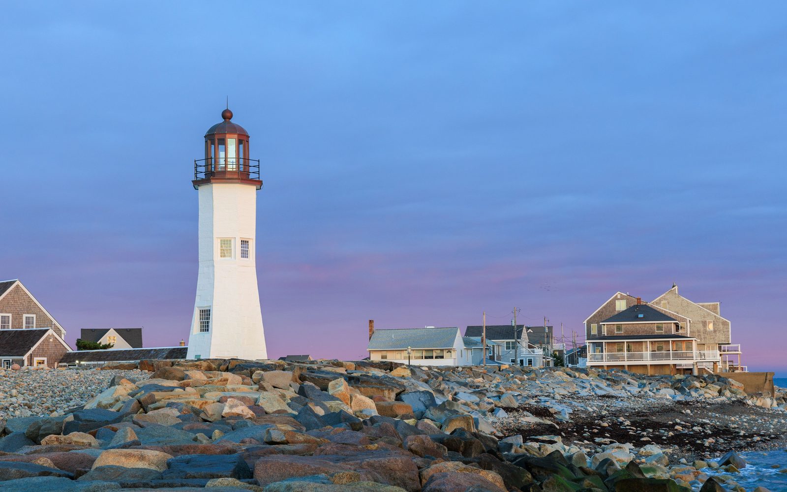 Illustrated coastal skyline near Scituate harbor, navy silhouette against a cream sky